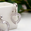 Heart-Shaped Pendant With Shimmering White Beads